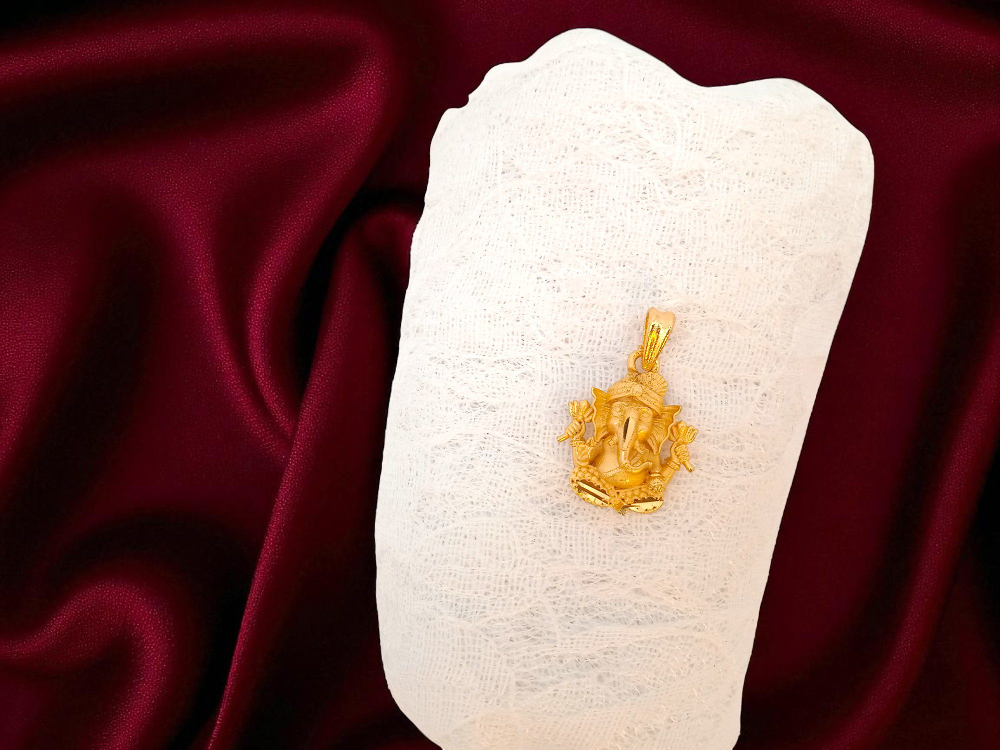 Forming Gold Plated Ganesha Dollar